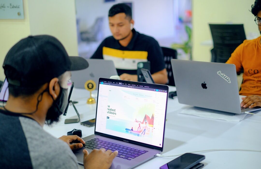 Group of people in a training session with laptops